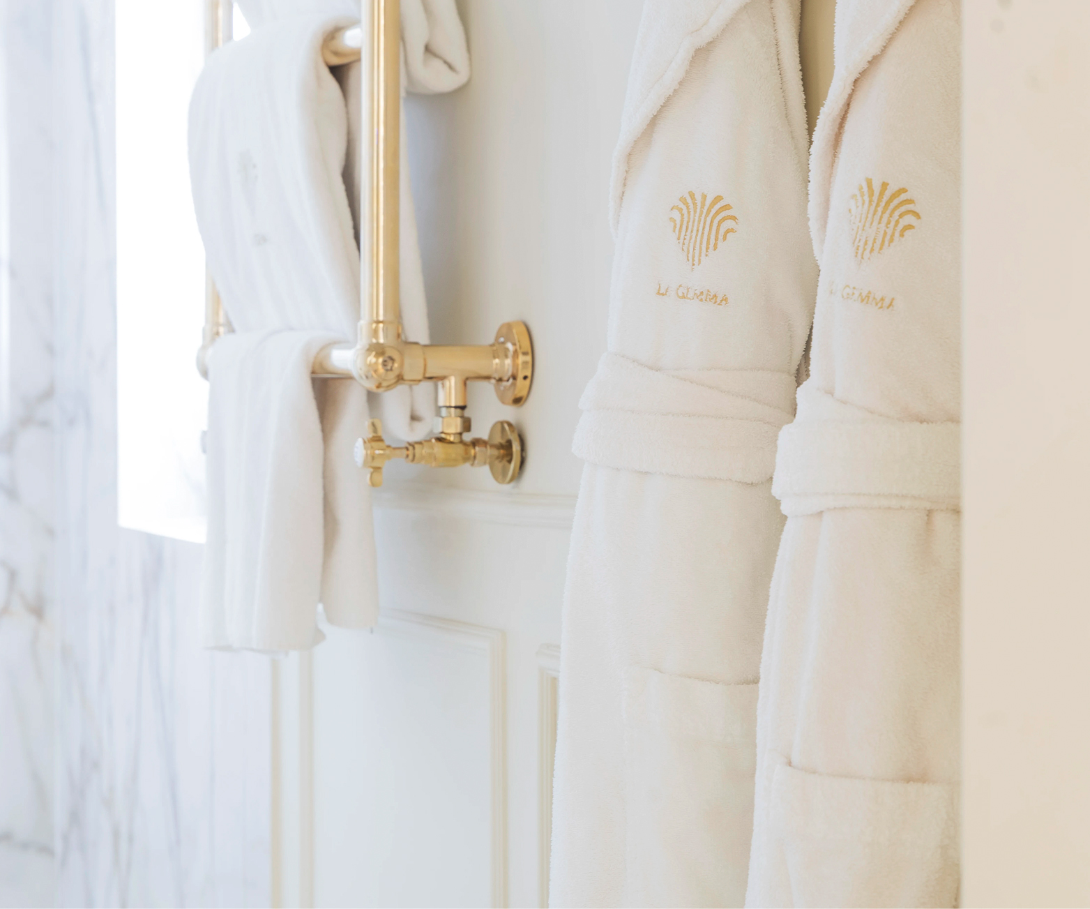 Superior Room bathroom with bathing robes