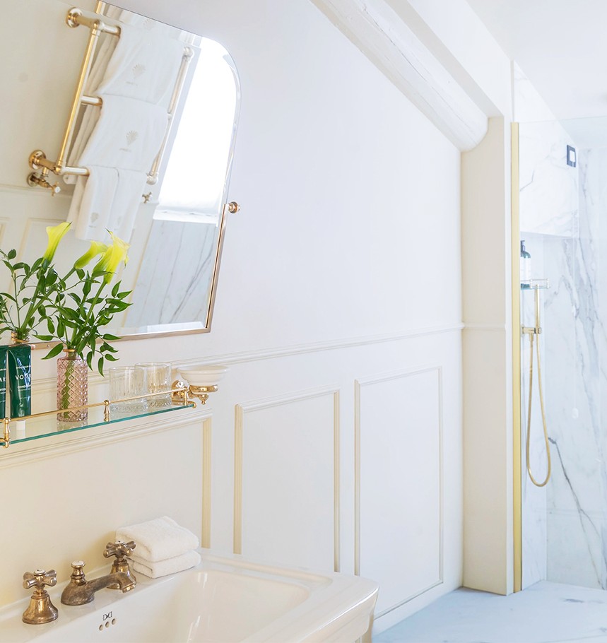 Junior Suite marble bathroom with sink and shower
