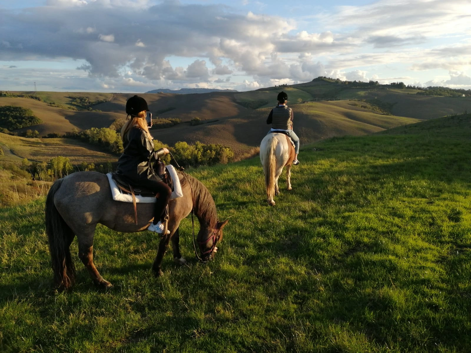 Horse riding through the Tuscan hills